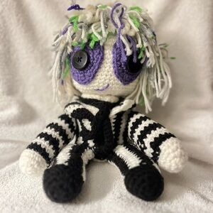 Hand crochet Beetlejuice. Made from 100% acrylic, yarn and fiber filling..